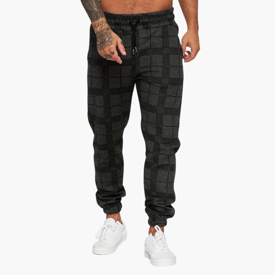 2_2_16edc5ac-ac87-4cb5-baa8-93649cc34896.jpg Men's pants with elastic waistband and checkered surface - Image 1