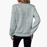 Women's pullover with zipper at the neckline and cable knit surface - Image 6