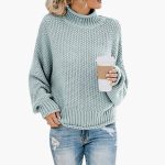Women's sweater with high neckline and ribbed hem
